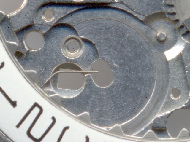 dial side: detail bearing date wheel with spring