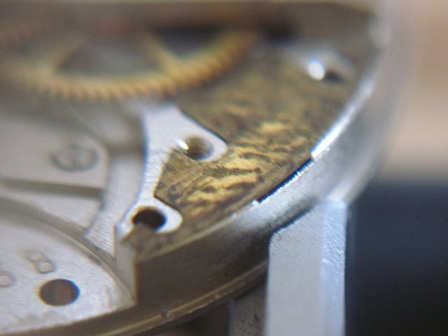 detail: balance cock mounting